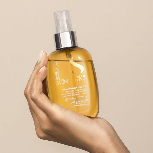 Alfaparf Sunshine Hair Protective Oil | Two-phase Spray Oil | UV Filters | Sun Exposed Hair | Protective Barrier | Protects Hair Fiber | Protects Hair Color | Anti-dryness Action | Shiny | Soft | Disciplined | Protected Hair | Tames Frizz | Controls Flyaways | Smooth | Manageable