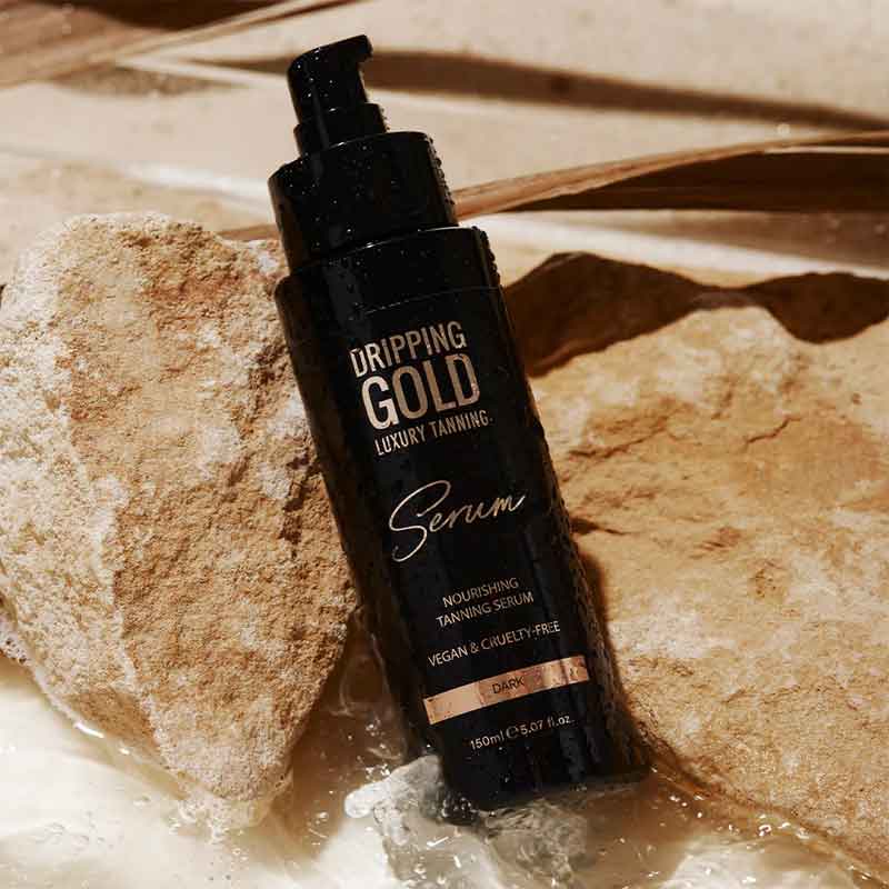 Dripping Gold Luxury Tanning Serum deep tone | natural radiance| gorgeous tan | pamper | golden | glow | bronze | ready to wear | tropical scent | fluid | quick dry down | enriched | promote skin health | Squalane hydrates | Rosehip Oil brightens | Goji Berry