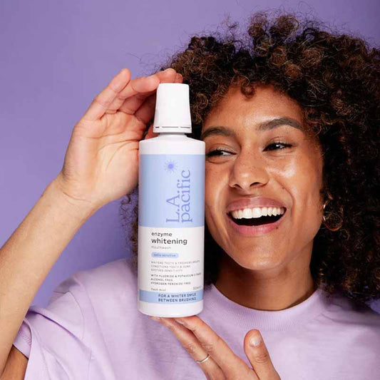 LA Pacific Extra Sensitive Enzyme Whitening Mouthwash | brighter | smile | luminous | whitening | extra |sensitive | minty fresh | potassium citrate | soothes sensitivity | vitamin E | antioxidant | neutralize free radicals | soothe gums | sodium fluoride | fights cavities