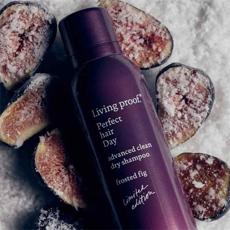 picture of bottle on top of frosted snow covered halves of figs