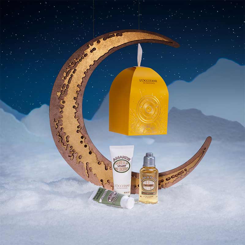 L'OCCITANE Almond Ornament With Products In Night Scene With Moon