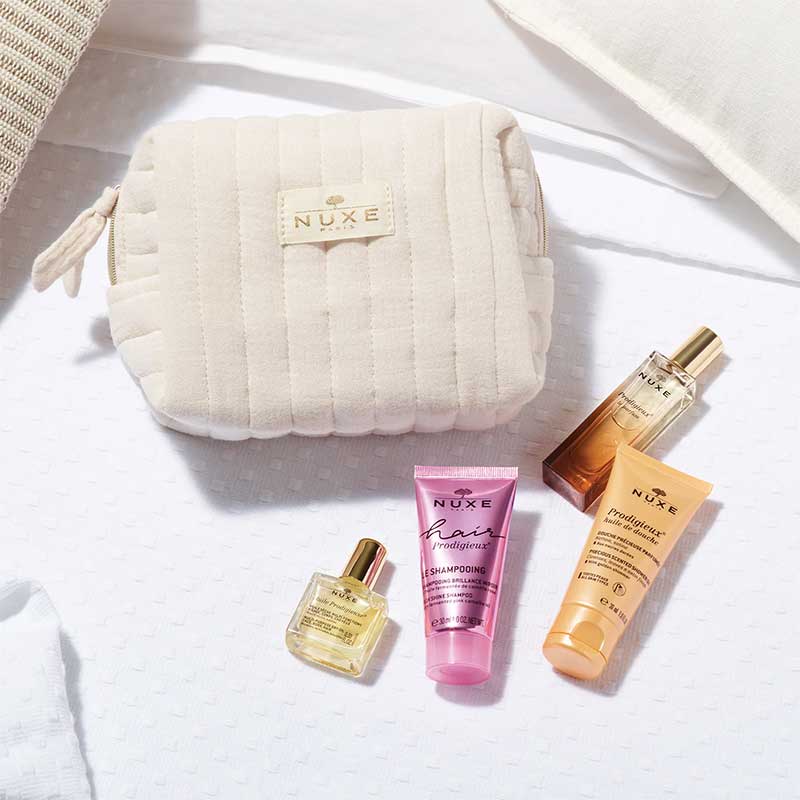 nuxe beauty essentials travel bag and products
