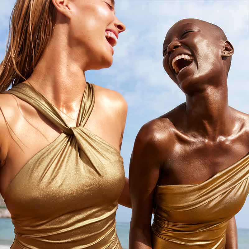 NUXE Sun Oil Gold Shimmery High Protection SPF 30 Model Image