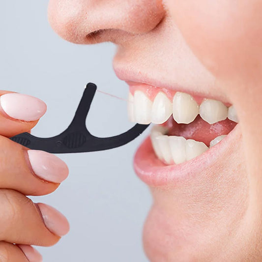 Spotlight Floss Picks for Whitening Teeth | Teeth whitening strips | tooth floss | tooth picks | Spotlight oral care | whitening teeth products