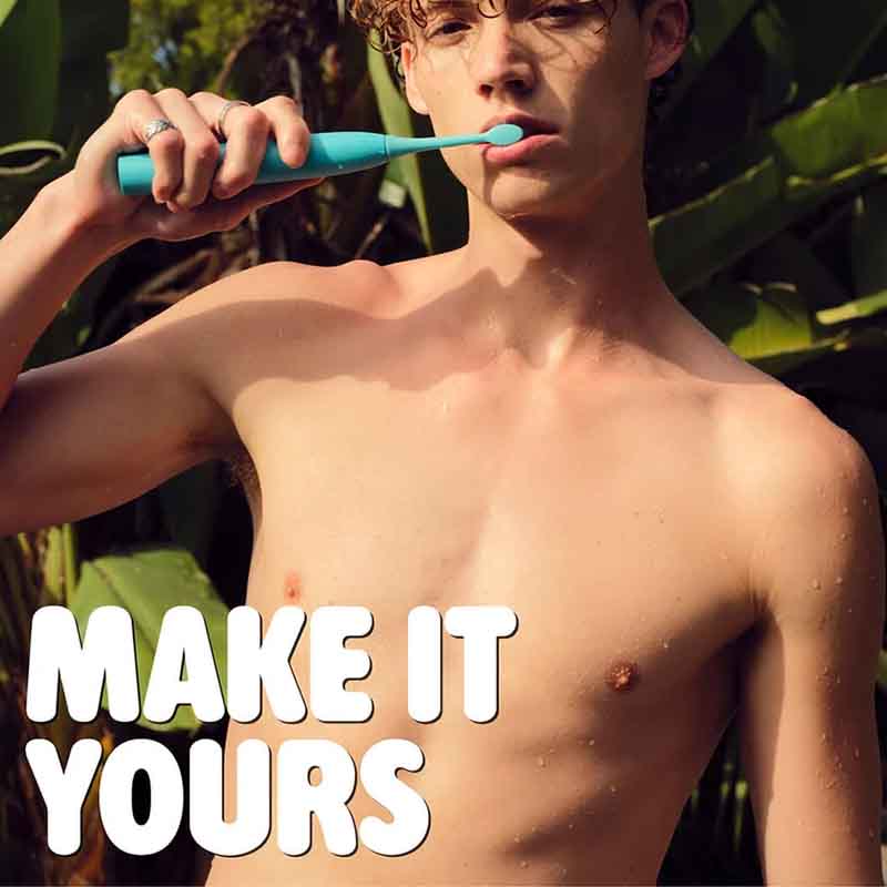 Spotlight Oral Care Sonic One Toothbrush Blue man brushing his teeth outside text on screen saying make it yours