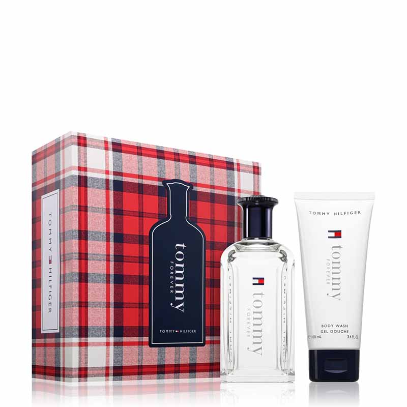 Tommy Hilfiger fragrance gift set featuring a red, navy, and white plaid box, a clear glass Tommy Hilfiger Eau de Toilette bottle, and a white Tommy Hilfiger Body Wash tube on a white background.