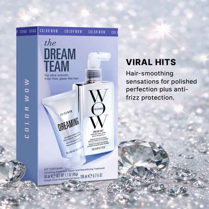 ColorWom The Dream Team hair care kit shown in its retail box, with a bottle and tube displayed in front on a sparkly silver background. Text on the right reads 'VIRAL HITS' and describes hair-smoothing and anti-frizz protection.