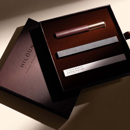 Hildun Beauty Power Precision Set Noir Makeup Gift Set image of box opened up with a glimmer of light shining on the products