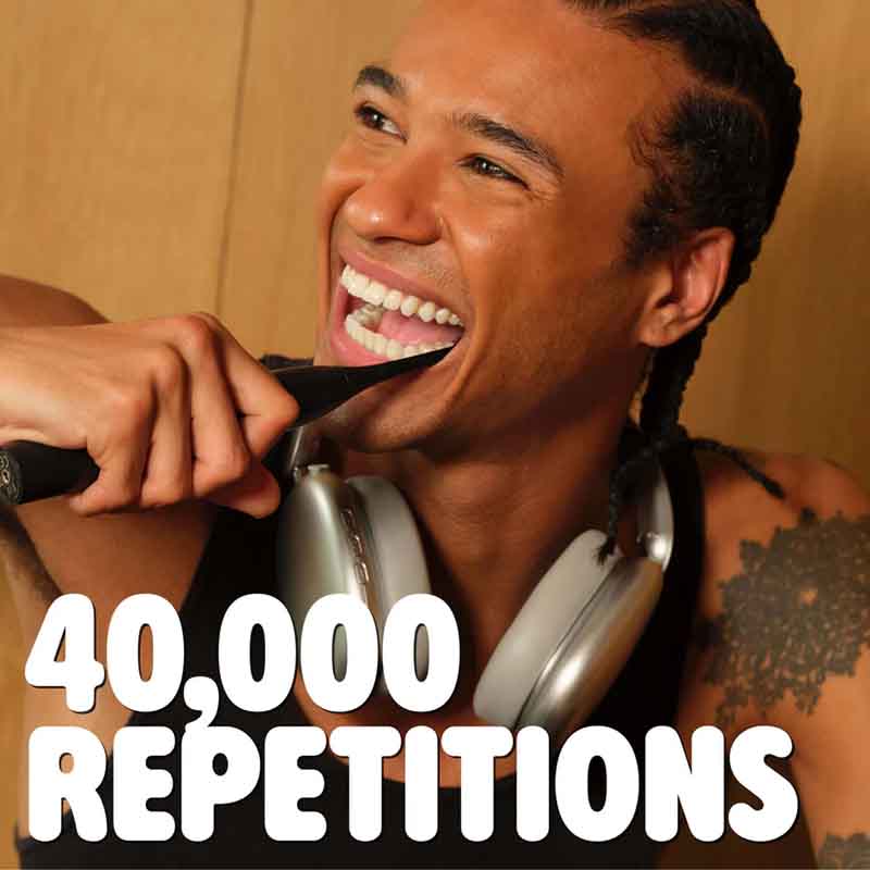 Spotlight Oral Care Sonic One Toothbrush Black man brushing teeth on text says 40,000 repetitions 