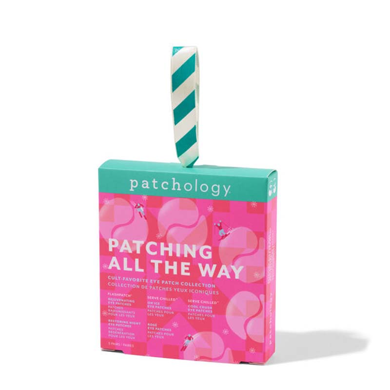 Patchology 'Patching All the Way' gift box with a teal and pink design and a striped hanging ribbon, photographed on a white background.