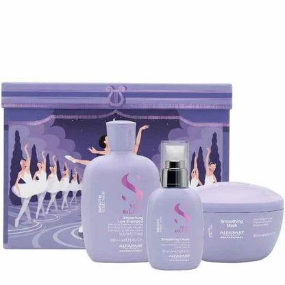 A beauty gift set featuring a lavender smoothing line shampoo bottle, a smoothing cream pump bottle, and a smoothing cream jar, displayed in front of a decorative lavender gift box with ballerina illustrations.