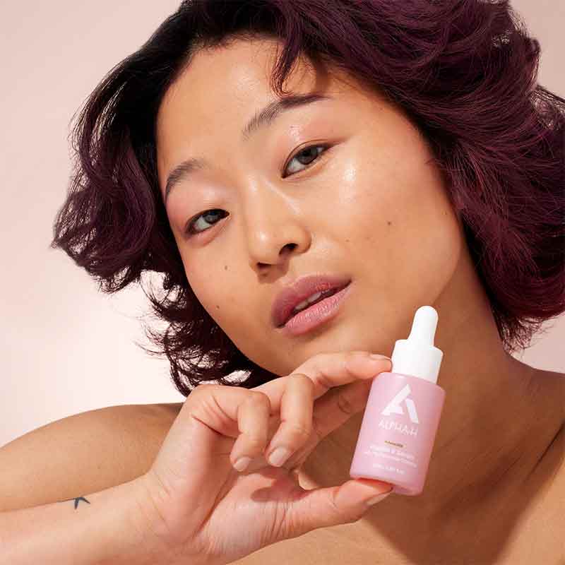 Alpha-H Vitamin E Serum with 1% Ceramide Complex | vital vitamin e alpha h | vitamin serum on model
