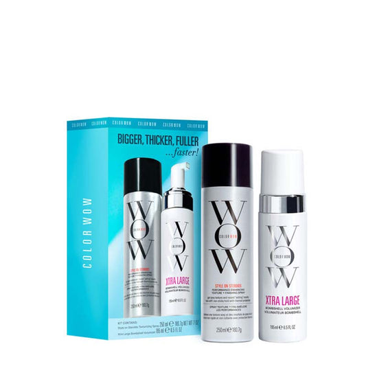 Color Wow Xtra Large hair growth and conditioning set, featuring a bright blue box, a white pump bottle, a white canister with a black cap, and a white bottle with a silver cap, arranged on a white background.