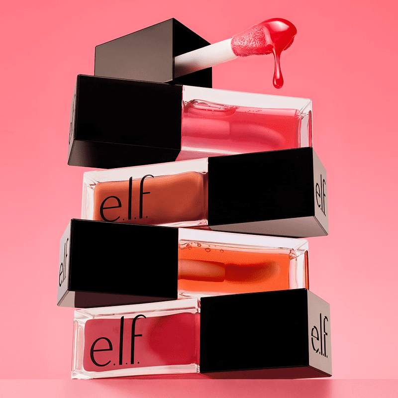 e.l.f. Glow Reviver Lip Oil | Nourishing tinted lip oil | High-shine finish | Hydrates lips | Enhances natural color | Oversized plush cushion applicator | Infused with Squalane, Apricot oil, Avocado oil, Jojoba oil, and Pomegranate oil | Sheer wash of color | Refreshing minty scent | Wear alone or over lipstick | Vegan & Cruelty-Free