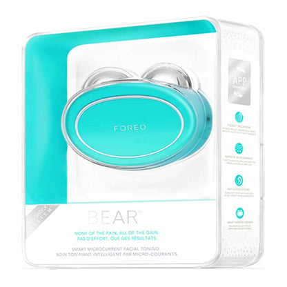 Foreo Bear | microcurrent | toning device | Anti-Shock System™ | full facial | workout | 2 minutes | clinically proven | effective | facial device | market | gently stimulating | firming | 69 muscles | face | neck | appearance | aging | clinical results | science-backed | technologies | professional | facelift treatment | home | mint | fuschia | stand | serum | glide | jawline | cheekbone | forehead | light pressure