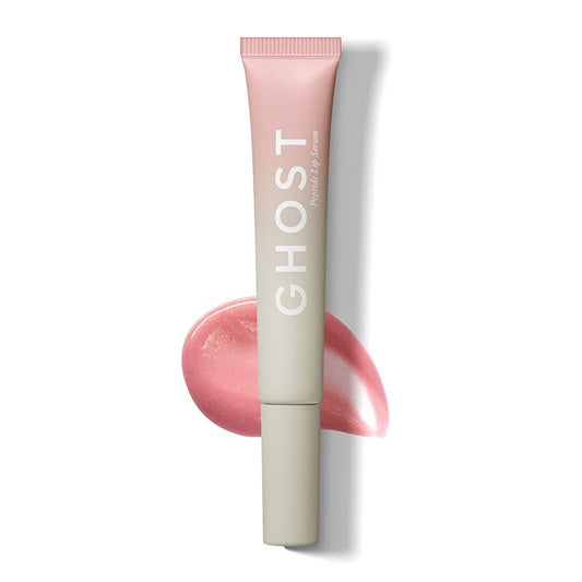 A squeeze tube of GHOST Popcorn Lip Balm in a pale pink shade, shown vertically with a matching pink product smear behind it on a white background.