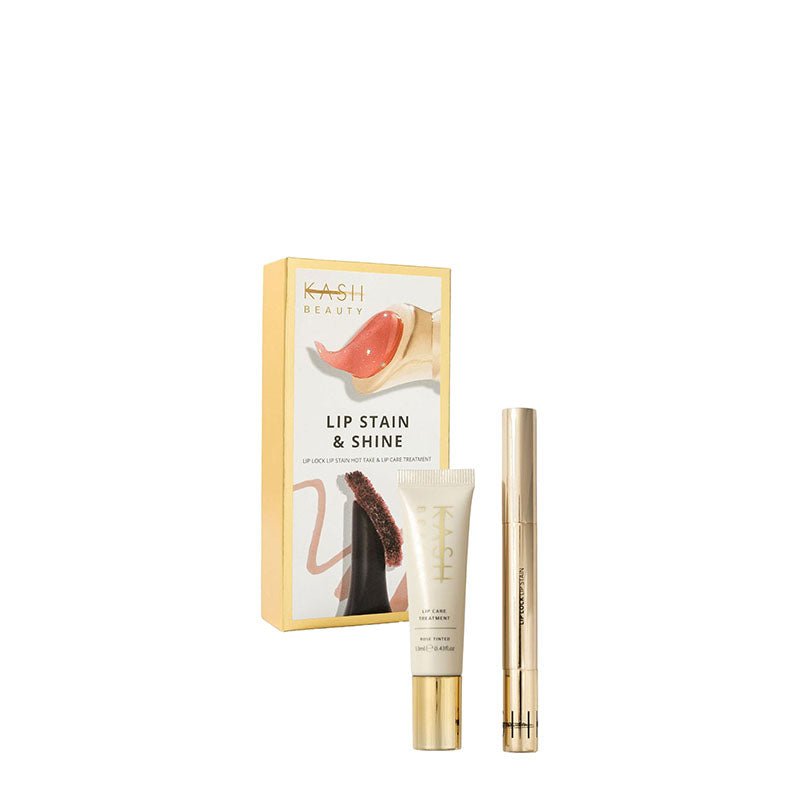 Kash Beauty Lip Stain & Shine set featuring a gold and white product box, a lip stain tube with a gold cap, and a matching metallic gold pencil on a solid white background.