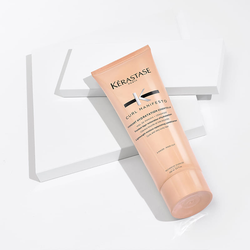 Kérastase Curl Manifesto Fondant Hydratation Essentielle Lightweight Moisture Replenishing Conditioner | for curly and very curly hair | infused with Manuka Honey and Ceramide | keeps curls moisturized and bouncy | lightweight formula.