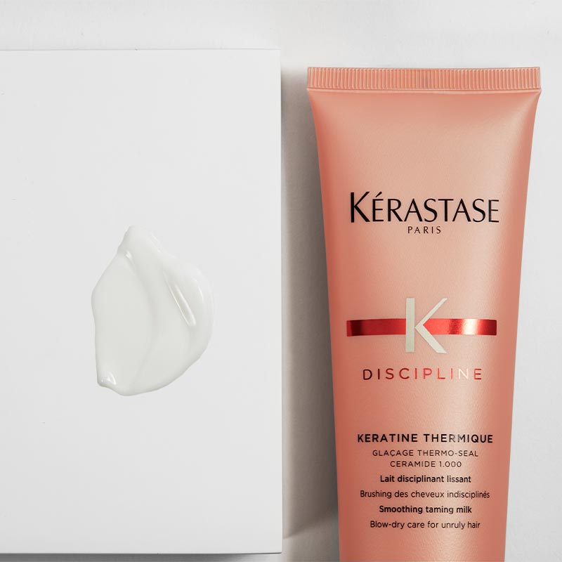 Kérastase Discipline Keratine Thermique Smoothing Taming Milk | resurfaces and shields hair | tames unruly locks | prevents humidity effects | offers heat styling protection.