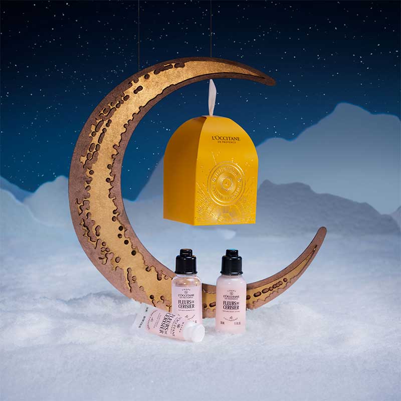 L'OCCITANE Cherry Blossom Ornament With Products In A Night Sky Scene