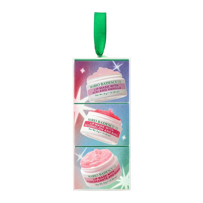 Mario Badescu holiday ornament featuring three stacked jars of lip care cream with a green ribbon loop at the top, set against a plain white background.