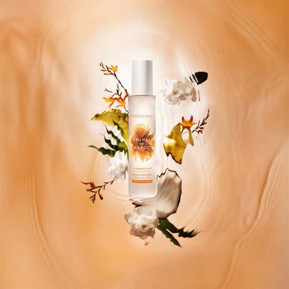 Morccanoil Brumes du Maroc Ambiance De Plage with coconut and orange flowers behind the product