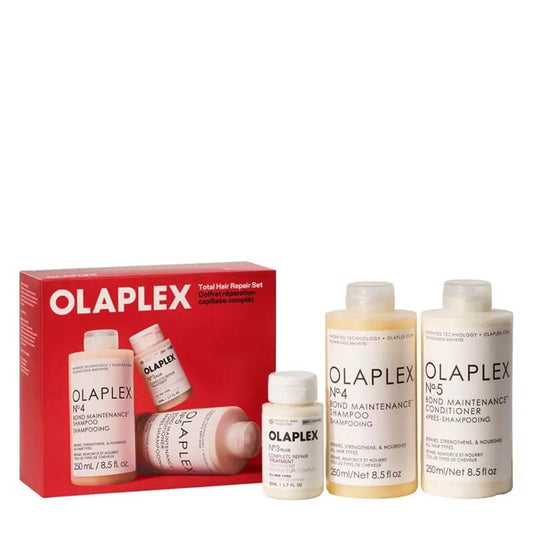 Olaplex Total Hair Repair Set featuring a red retail box and four white bottles of hair care products including shampoo, conditioner, and bond maintenance products, on a white background.