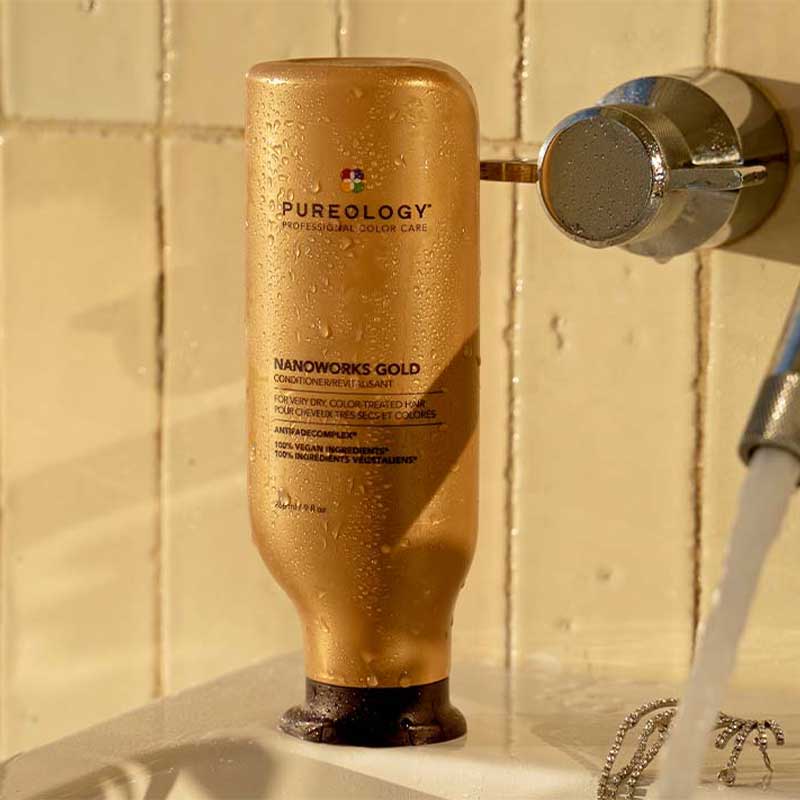 Pureology Nanoworks Gold Conditioner sitting in the bathroom