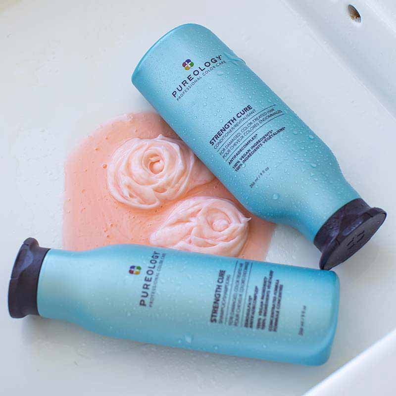 Pureology Strength Cure Shampoo and Conditioner in the shower