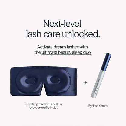 Silk sleep mask with built-in eyecups and eyelash serum on a white background