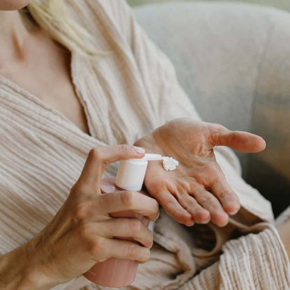 Skin Formulas Hand Lotion being pumped in a woman's hand