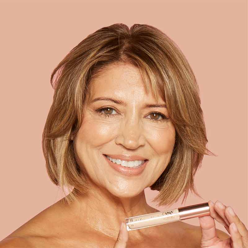 SOSU by Suzanne Jackson Wake-Up Wand Correcting Concealer | shade 05 beige on model