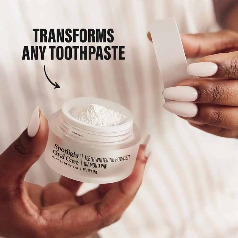 Spotlight Oral Care Christmas Bauble product opened with text on screen saying 'transforms any toothpaste'