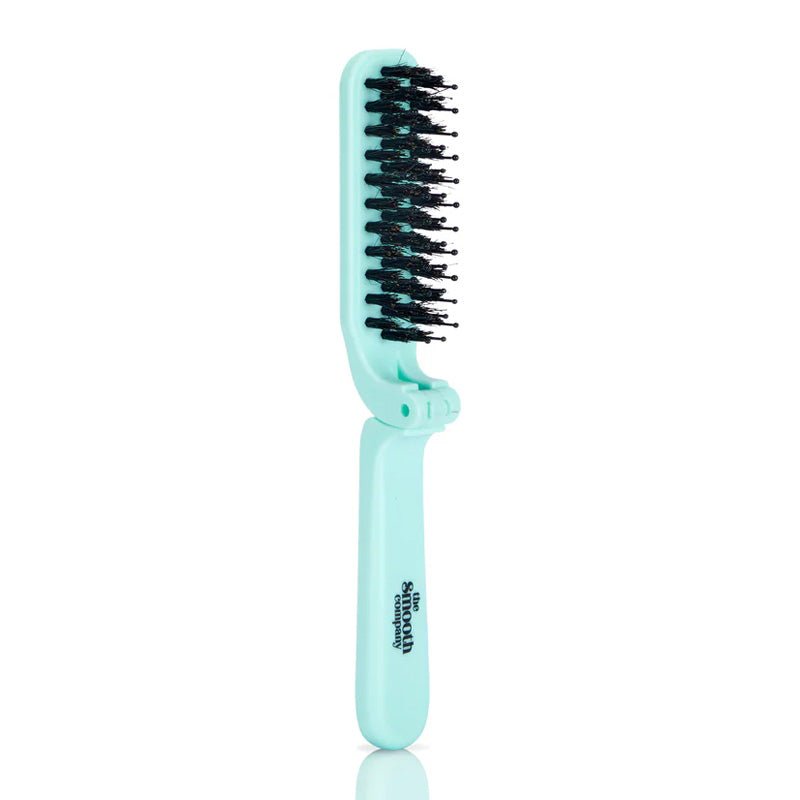 The Smooth Company Foldable Travel Hairbrush | Perfect hair styling tool | Keep your mane smooth | On the go | Lightweight | High quality travel brush | Detangle with ease | Keep hair looking sleek | Convenient travel size | Folds in half | Fits in any bag | Compact | Stay smooth wherever you are