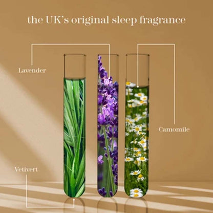 Three decorative glass test tubes filled with botanical designs labeled Lavender, Camomile, and Vetivert, set against a warm beige background with text reading 'the UK's original sleep fragrance'.