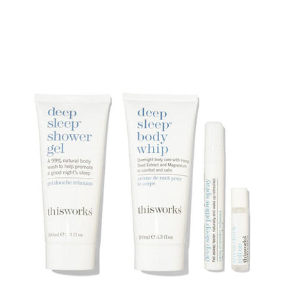 Thisworks Deep Sleep Shower Gel and Deep Sleep Body Whip set with two white tubes and two small white bottles on a clean white background.