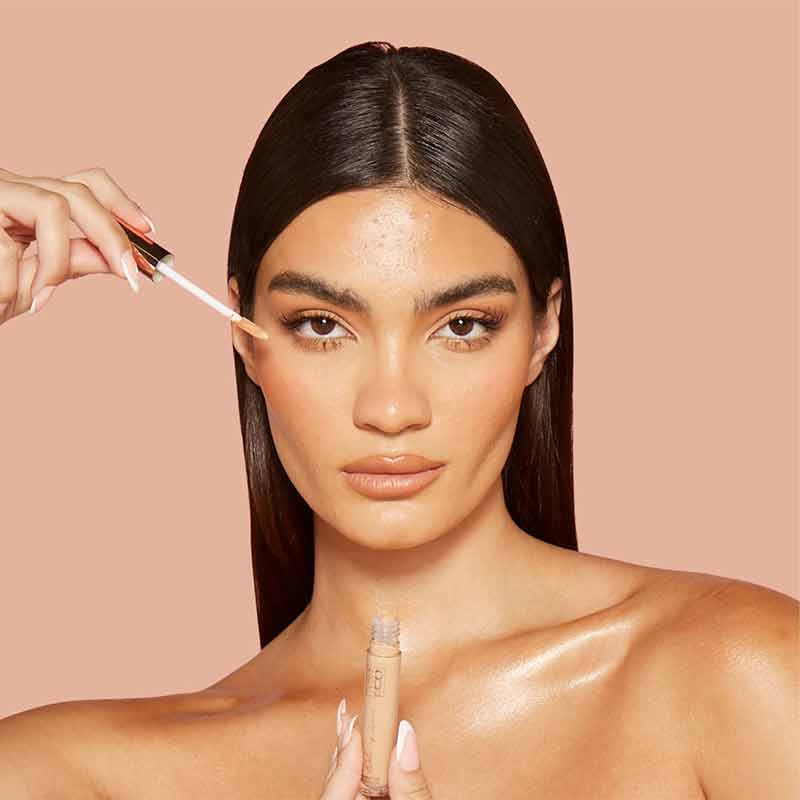 SOSU by Suzanne Jackson Wake-Up Wand Correcting Concealer | shade 06 golden on model