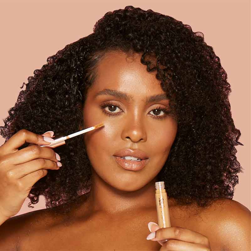 SOSU by Suzanne Jackson Wake-Up Wand Correcting Concealer | shade 07 tan on model