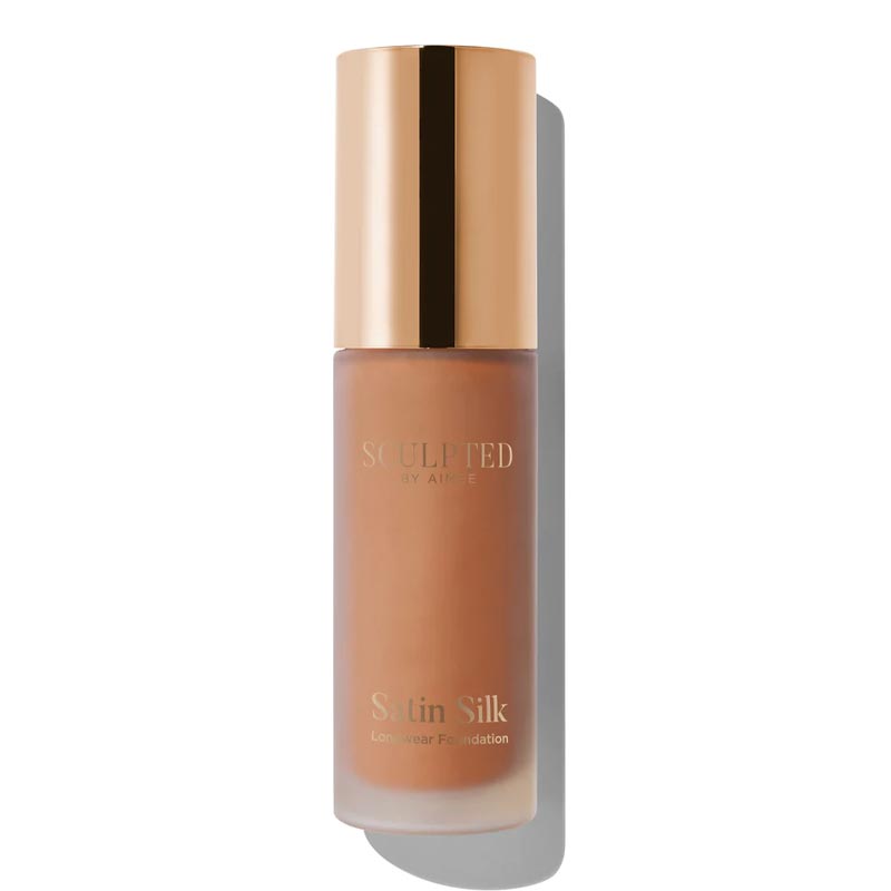 Sculpted By Aimee Connolly Satin Silk Longwear Foundation | radiant | medium to high coverage | flawless base | feels lightweight | skin | satin silk finish | glides smoothly | complexion | won't clog pores | Infused with skin-loving ingredients | hydrating formula | nourished | plump | foundation | sit comfortably | 8+ hours.